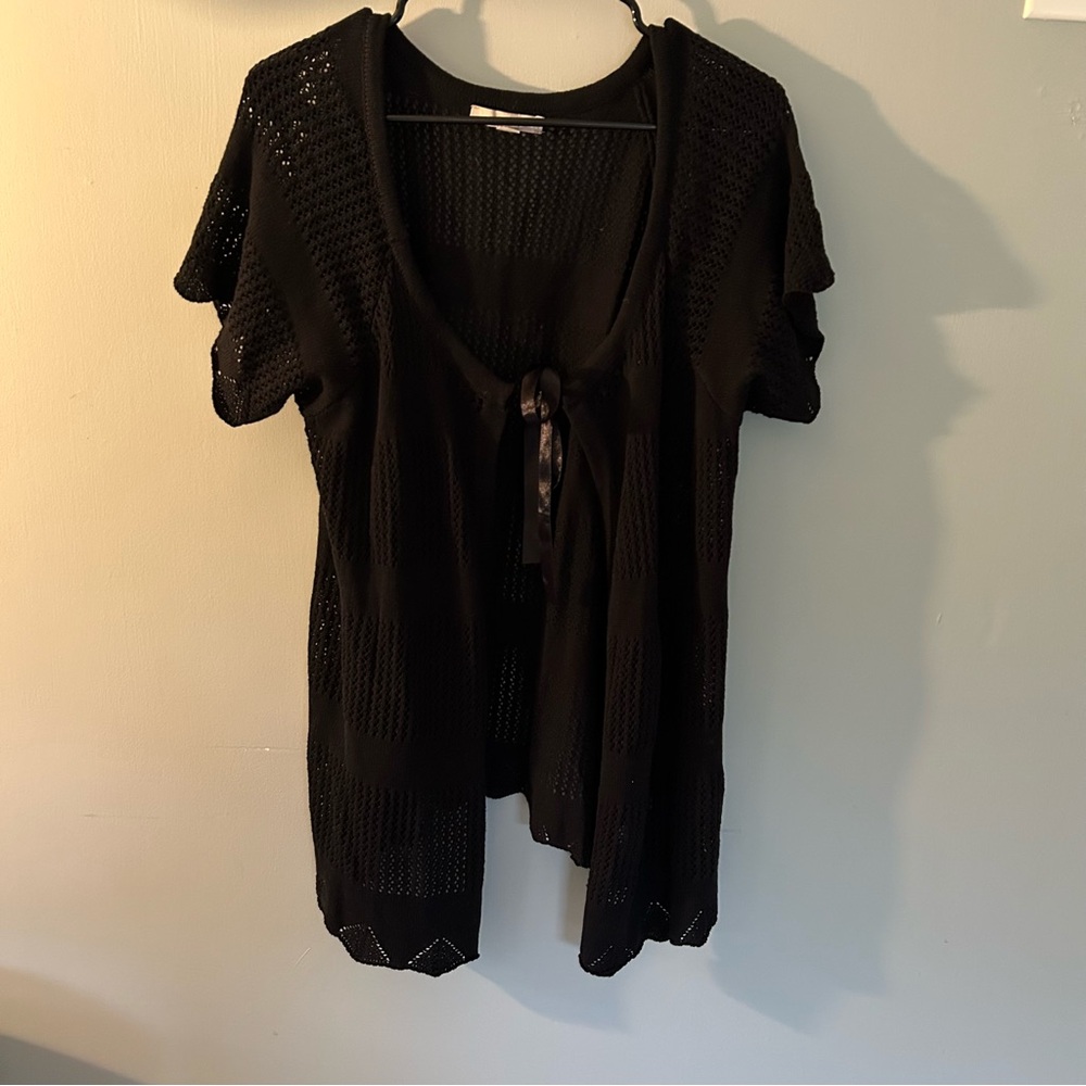 Woman Within Black Crochet Top With Open Front And Bow Closure